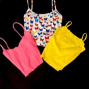 Three medium crop tops (pink, yellow and white with colorful butterflies)